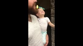 Butterfly lands on baby's head