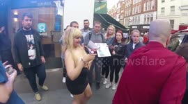 Woman flashes Liam Gallagher as he leaves radio interview