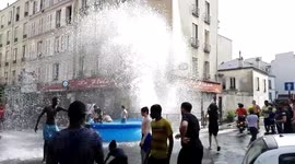 Paris residents use fire hydrant to fill pool on hot spring day