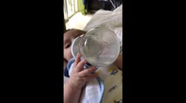 2 months baby drinks his bottle of milk all alone!! so cute