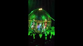 This stunt is insane! Three motorcycles in circus ball cage