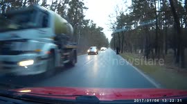 Mother runs with stroller on busy road