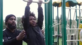 Determined girl, 7, overcomes fear of monkey bars with help from dad