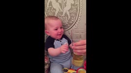 Eight-month-old baby loves beer