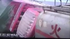 SUV gets buried in pebbles after it forces to overtake and causes lorry flips over