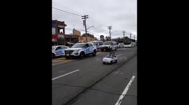 Twins, 2, drive in mini police car alongside NYPD officers