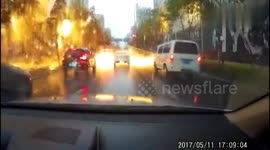 Lightning strike causes sparks falling on road