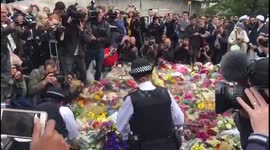 Police lay flowers at Borough Market