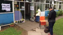 Voting Tellers set up their seats outside a Polling Station