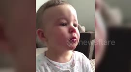 Baby crying while listening to Ariana Grande perform Over The Rainbow