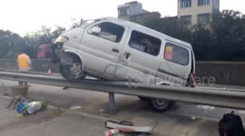 Out-of-control minibus rolls 720 degrees after crashing into guardrails
