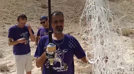 Men use fishing rod to retrieve drone fallen in canyon
