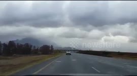 Truck blown over by strong wind