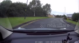 elderly lady cannot navigate around a simple roundabout correctly then a old man and his wife then run a red light within seconds in front of a police van.