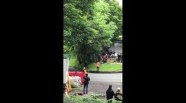 Motorbike and sidecar crash off road at Isle of Man TT