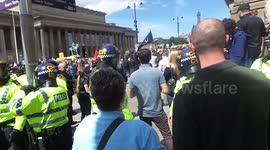 107 News - EDL supporters planning march kettled in by police Liverpool alongside big counterdemonstration