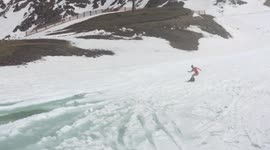 Small child almost hit by snowborder