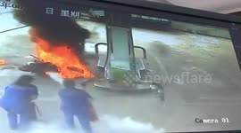 Motorbike bursts into flames at petrol station