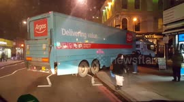 Lorry cuts corner nearly hitting pedestrians and cyclist