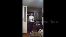 Newsflare Edit - Man smashes light bulb while opening bottle of champagne