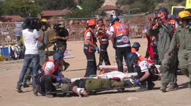 Homeland Security Soldiers, firefighters police and paramedics rescue injured people from earthquake during drill 3/7