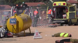 Homeland Security Soldiers, firefighters police and paramedics rescue injured people from earthquake during drill 5/7