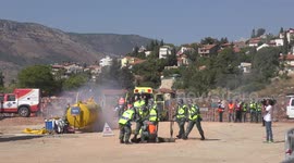 Homeland Security Soldiers, firefighters police and paramedics rescue injured people from earthquake during drill 6/7