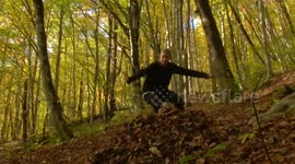 Skiing and snowboarding in a forest with no snow looks amazing