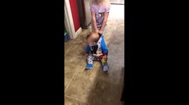 Baby can't crawl but big sister steps in and does something incredible.