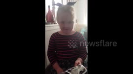 Girl bursts into tears as she learns she is going to be a big sister