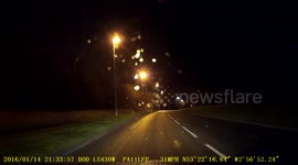 Car goes ROUND entire traffic light setup just to avoid a red