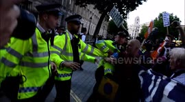 Hundreds march on Downing Street and call for Theresa May to step down