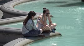 Trafalgar Square, London, swelters on hottest June day since 1976