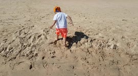 Hottest day on the beach...kiss them guns !!