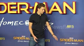 Tom Holland posing for 'Spiderman: Homecoming' photocall
