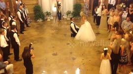 Bride and groom have awesome wedding dance battle