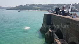 Jumping from peer in St Ives