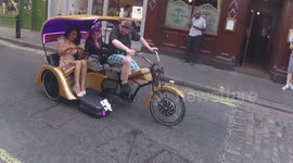 Chloe Khan's suitcase falls out of tricycle