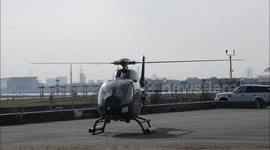Helicopter taking off from Royal Docks in London