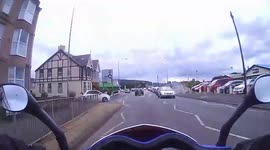 motorcycle gets hit by a car