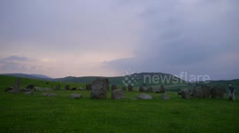 People viewing the Summer Solstice at Swinside Stone Circle Cumbria UK