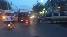 Scooter drive in busy Thailand, Koh Samui