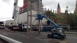 Workers building scaffolder to maintain Big Ben, London, UK