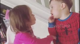 Twin toddlers unwanted kisses