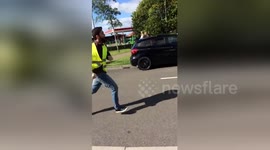 Paramedics run to assist victims after car ploughs into crowd in Newcastle