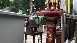 A Rat Having Lunch at a Buddhist Shrine