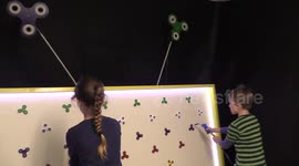 Father builds fidget spinner carnival game for his children