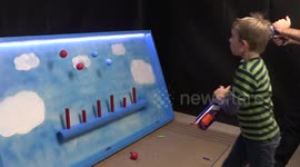 Father builds floating ball Nerf shooting gallery for his children