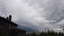 Timelapse shows wave-like pattern created by rolling clouds