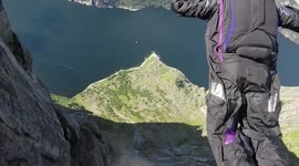 3 person waterfall BASE jump from in Kjerag, Norway